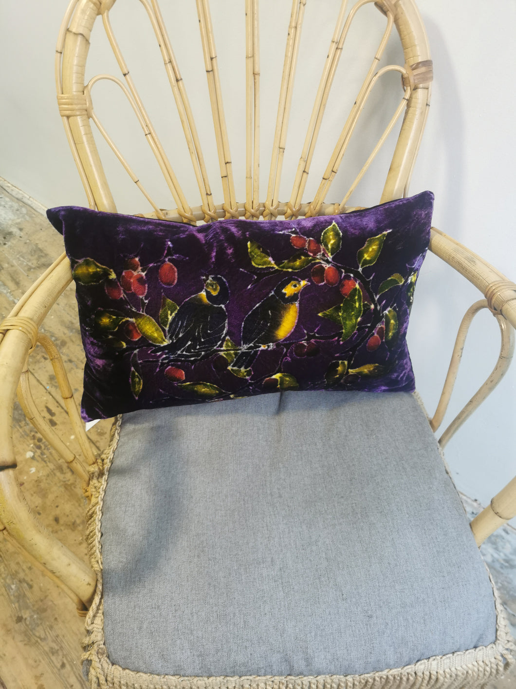 Hand-painted velvet cushions, SLOE BIRDS multi coloured on purple background.