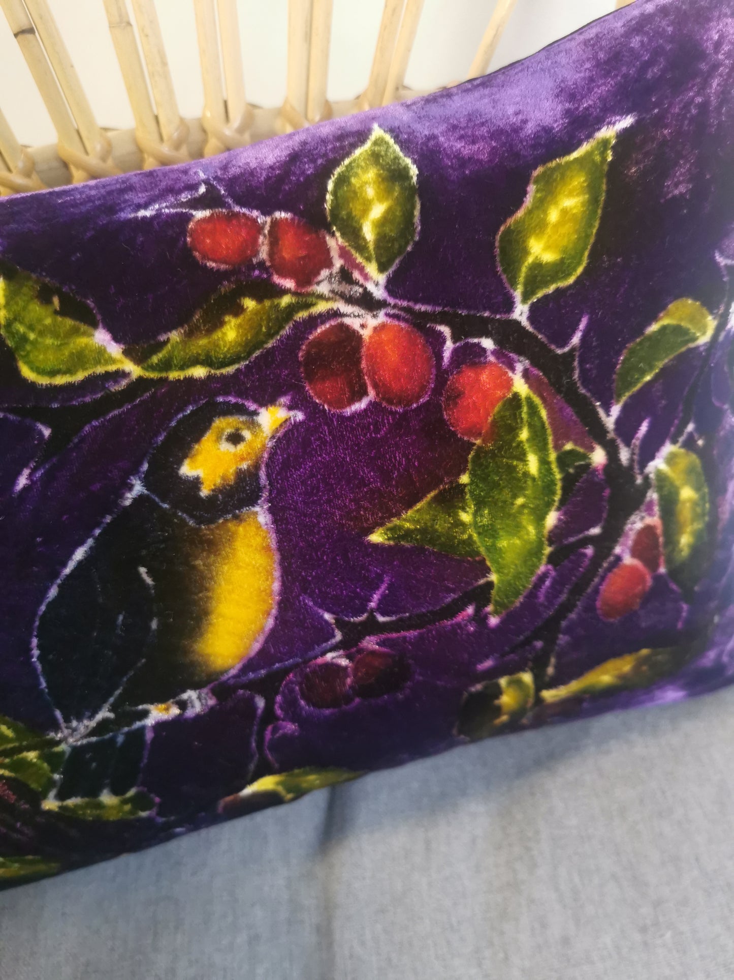 Hand-painted velvet cushions, SLOE BIRDS multi coloured on purple background.