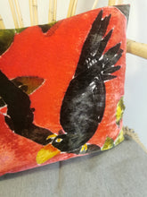 Load image into Gallery viewer, Hand-painted velvet cushions, TOCAN  blacks on red background.

