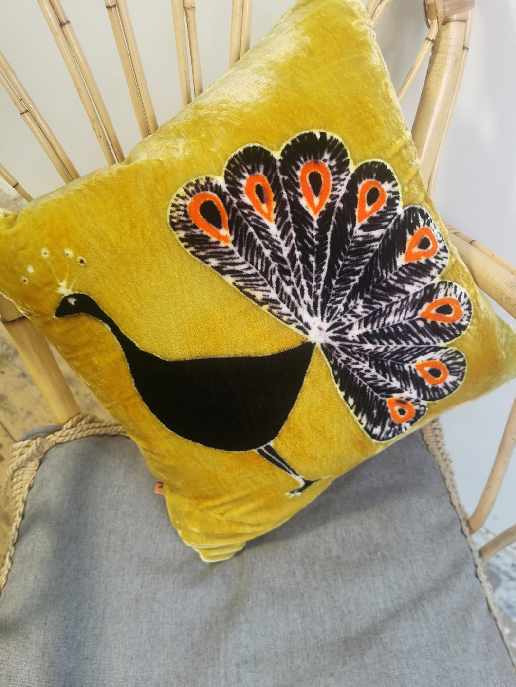 Hand-painted velvet cushions, PEACOCK multi coloured on mustard background.